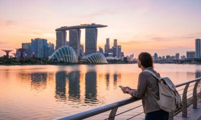 Traveler admiring Singapore's Marina Bay Sands and skyline at sunset during a few days in Singapore